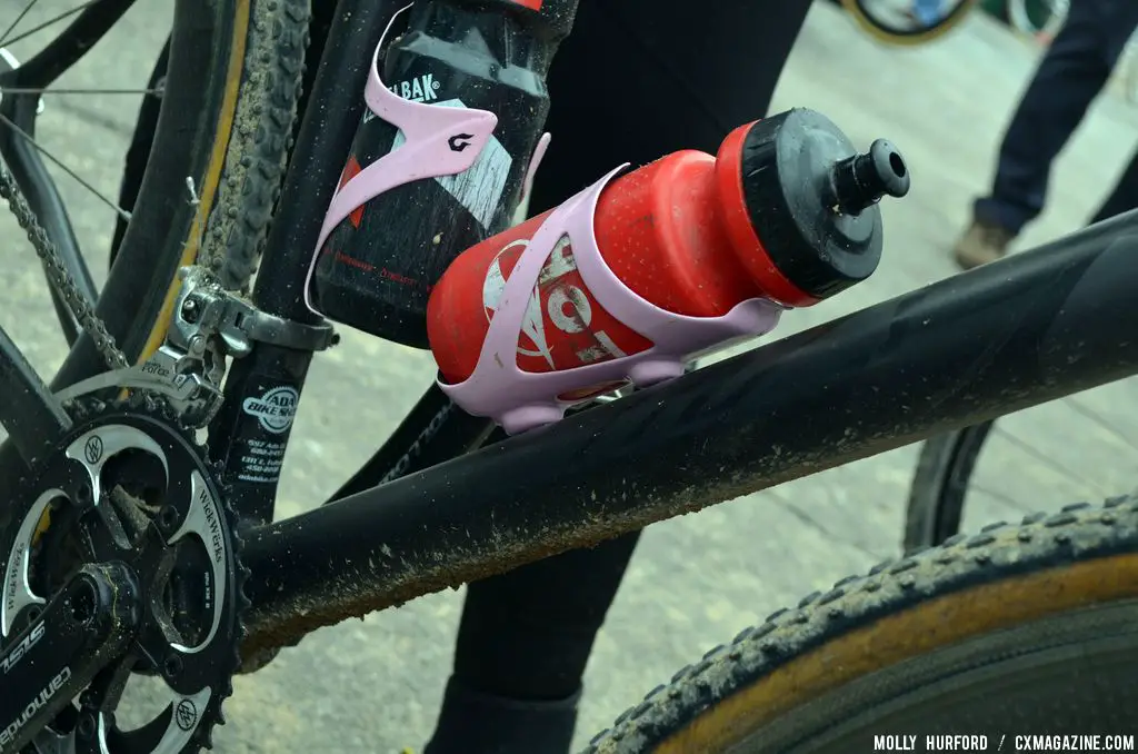 Ready for anything the road threw at her, double bottle cages on Mackenzie Woodring\'s carbon fiber Barry Roubaix-winning Foundry Auger. © Cyclocross Magazine