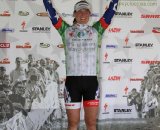 Katie in the leader's jersey on the podium © Amy Dykema