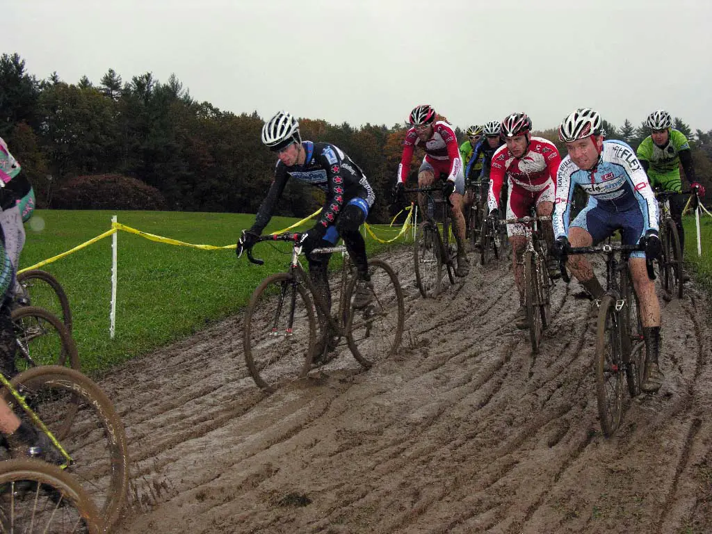 Elite men in 4 inches of thick mud on the first lap. ? Paul Weiss