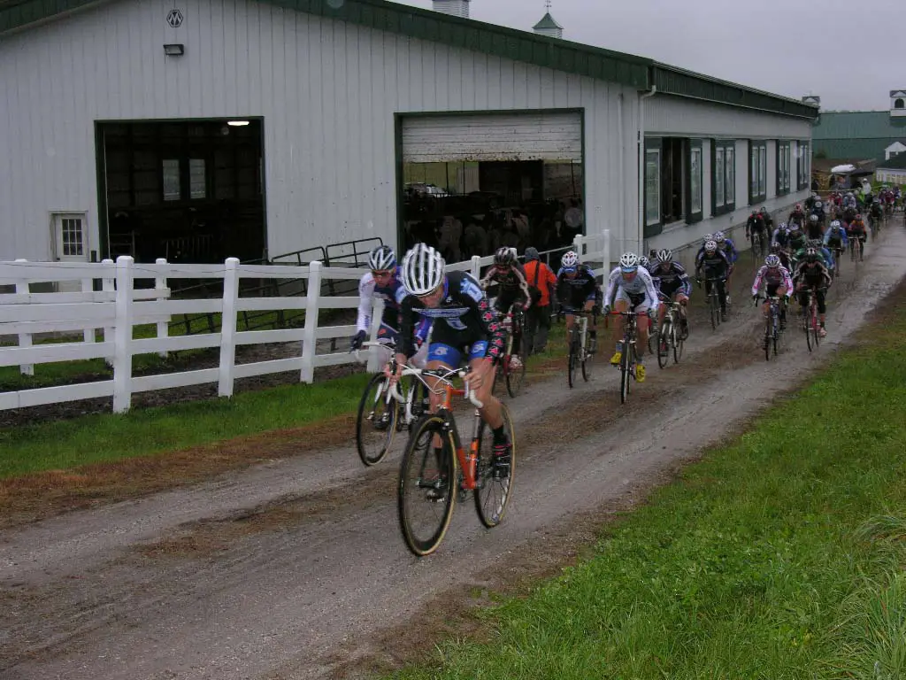 Elite men race past the cow barn. ? Paul Weiss