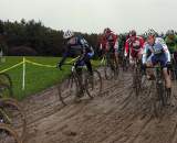Elite men in 4 inches of thick mud on the first lap. ? Paul Weiss
