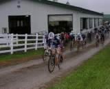 Elite men race past the cow barn. ? Paul Weiss