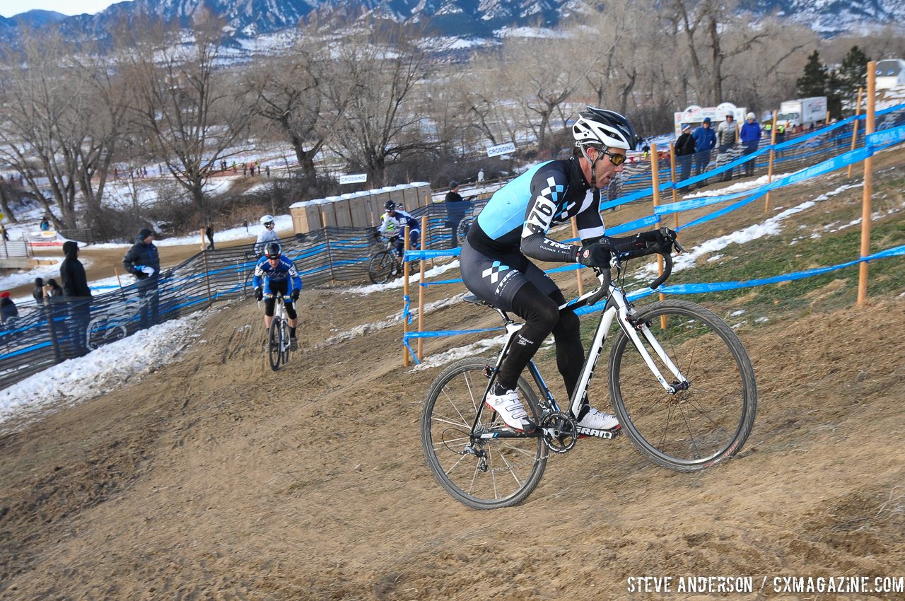 Tim Faia riding the off-camber climb with Myrah chasing. 2014 Masters 45-49 Cyclocross National Championships. © Steve Anderson