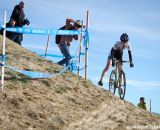 Katie Melena (Rock Lobster) navigates the tricky off-camber downhill.   Â© Brian Nelson