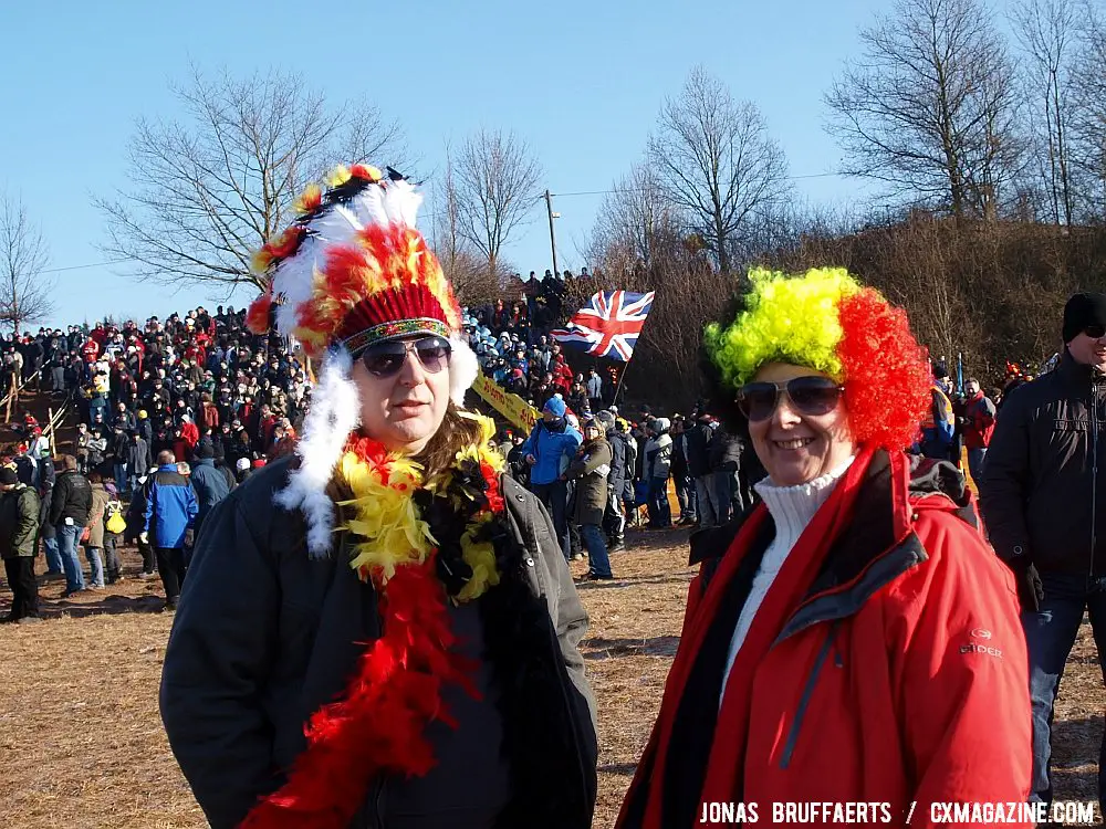 Indians mingle with clowns, and a Union Jack in the background