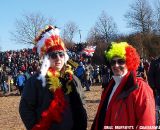 Indians mingle with clowns, and a Union Jack in the background