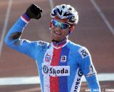 Zdenek Stybar is a happy champion giving a farewell present to T