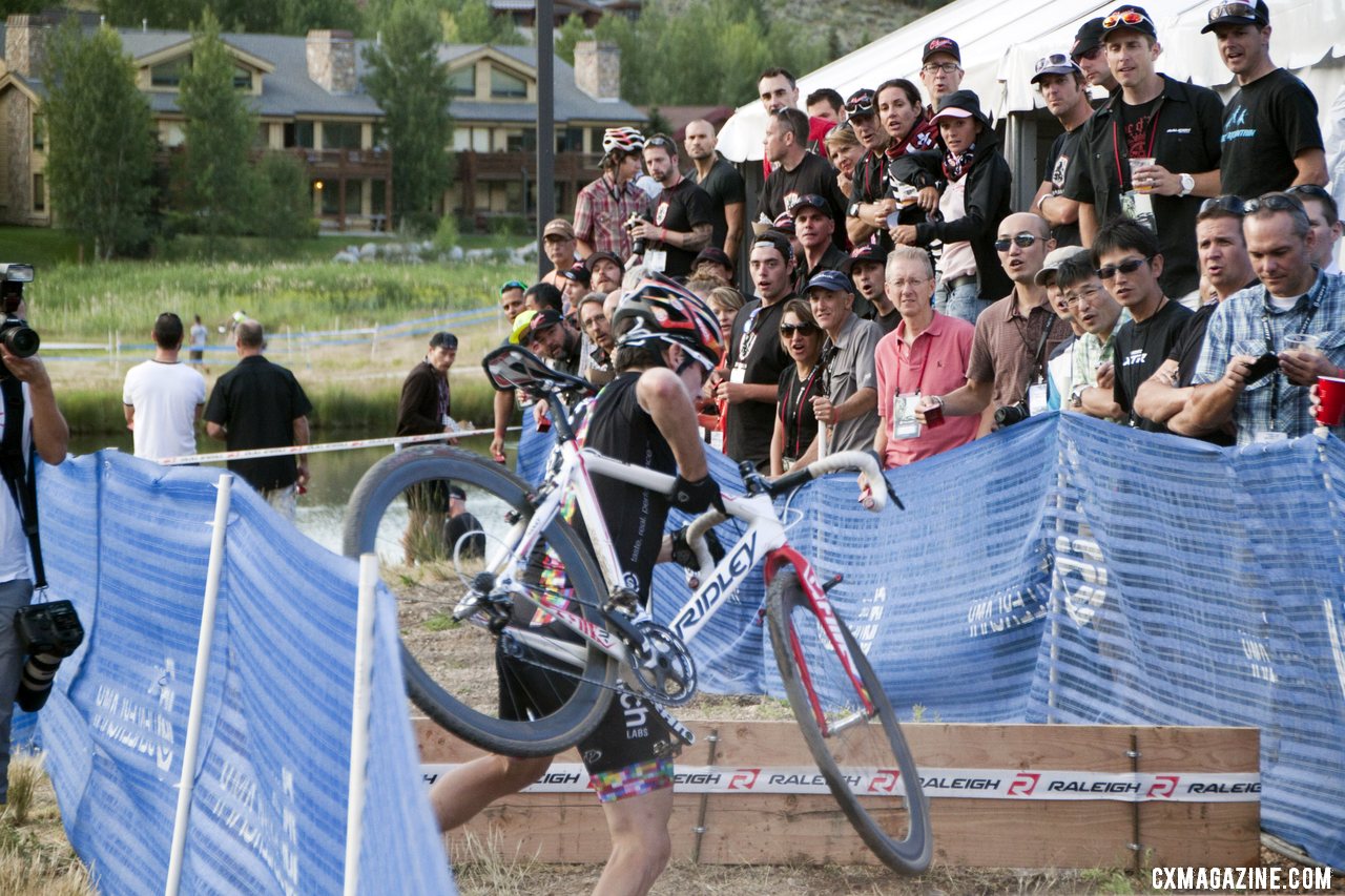 Angling into the barriers. 2012 Raleigh Midsummer Night Cyclocross Race. @Cyclocross Magazine