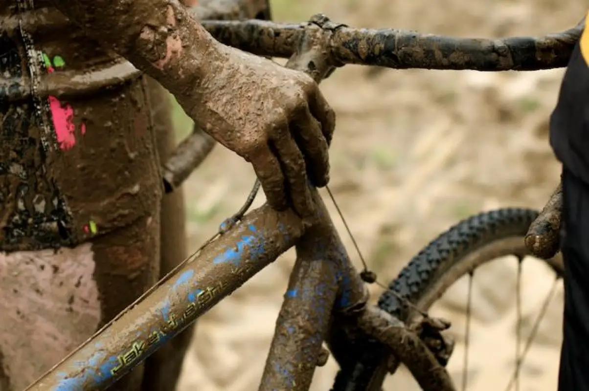 Rider and bike receive the mud treatment © Matthew J. Clark/www.strfilms.com 