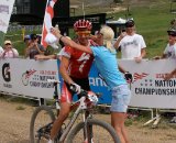 Wells' wife offers hearty congrats at the finish line © Amy Dykema