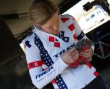 Katie Compton makes a cleat adjustment before Sunday's race. © Wil Matthews