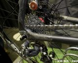 An aluminum derailleur hanger fits on the shaped carbon chainstay to seatstay joint. © Kevin White