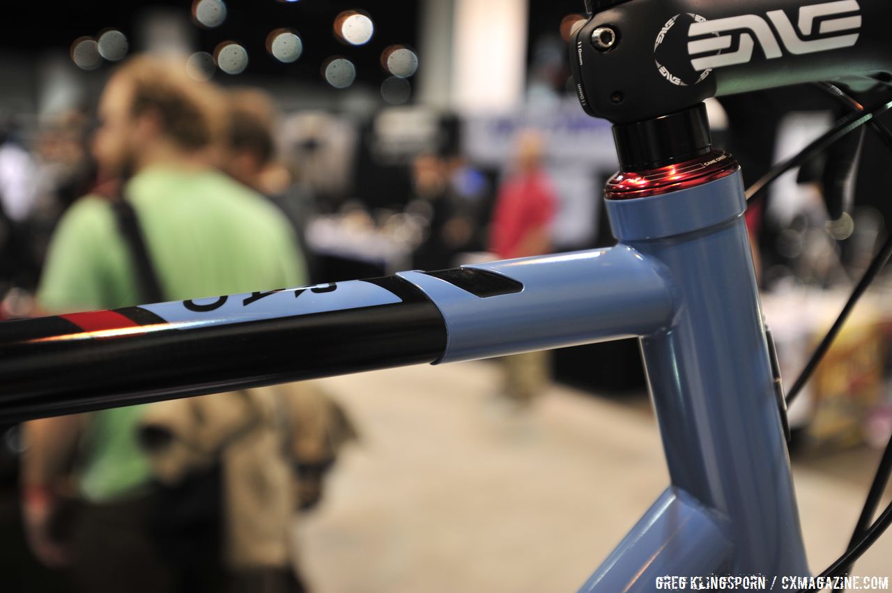 Titanium head tube pairs to carbon top tube and ti downtube  © Greg Klingsporn