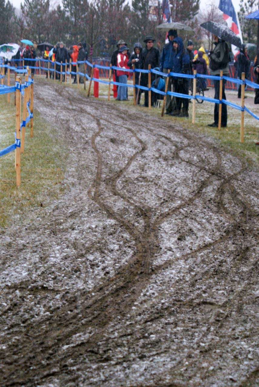Fresh tracks through mud and a snow dusting ©Kenton Berg
