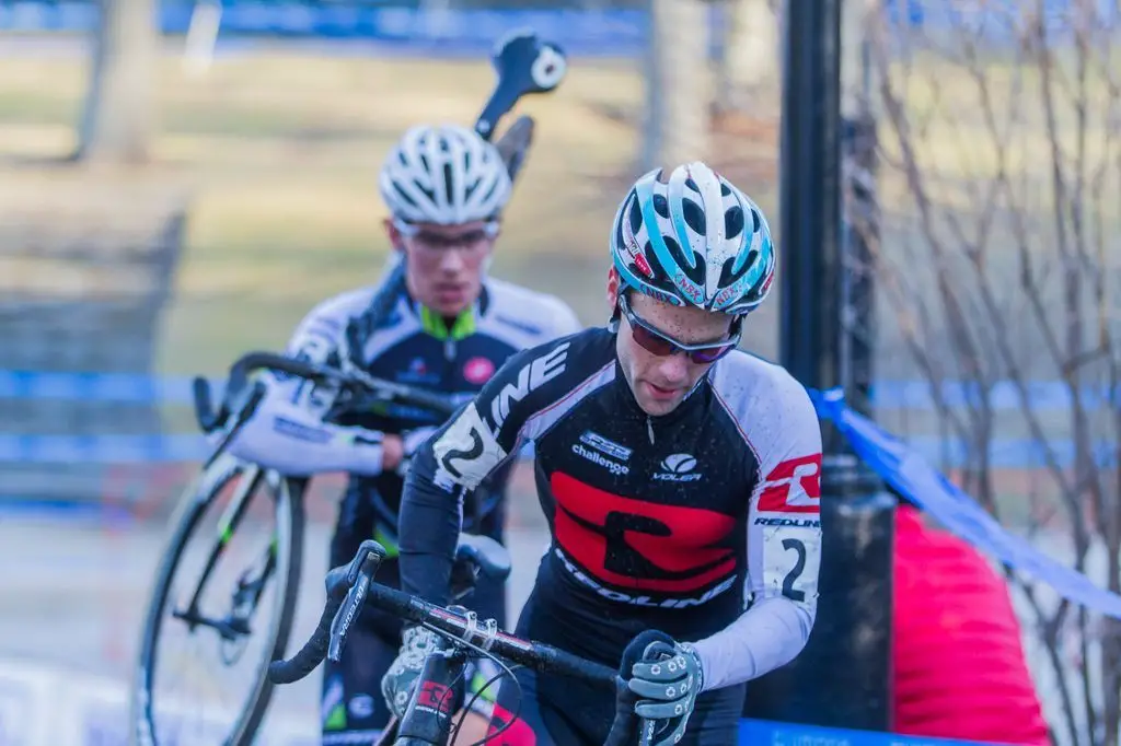 Justin Lindine (Redline-NBX) leading Curtis White (Cannondale p/b Cyclocrossworld) on a run up. © Todd Prekaski