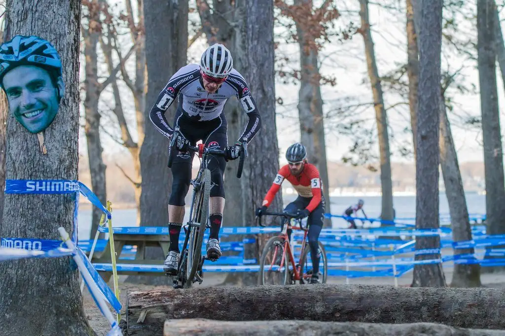 Raphael Gagne (Rocky Mountain Factory Team) hopping the logs ahead of Dan Timmerman (House Industries-Richard Sachs-RGM). © Todd Prekaski