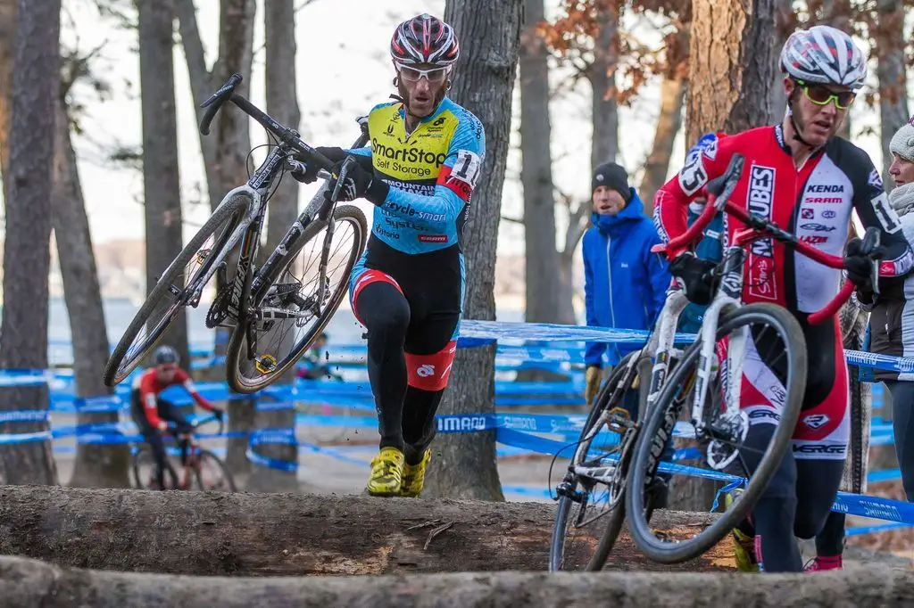 Adam Myerson (Team SmartStop p/b Mountain Khakis), center, negotiating the logs. © Todd Prekaski