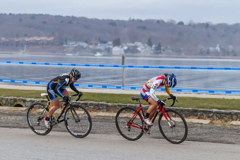 Kemmerer and van Gilder surge with the Greenwich Bay behind them. © Todd Prekaski