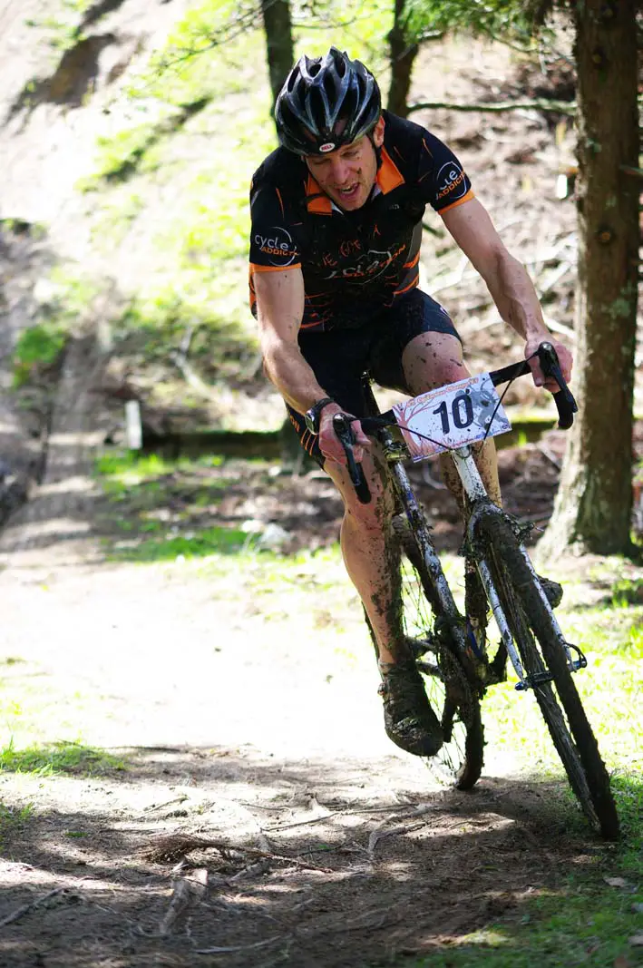 Jonty Taylor tastes the mud and loves it. by Greg Gibb