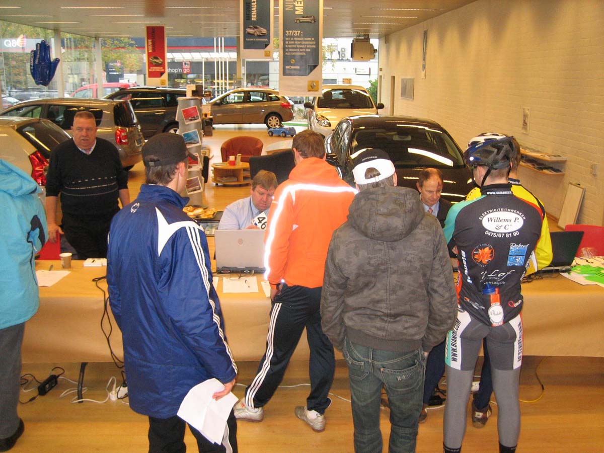 Jaarmaarktcross registration was held in a car dealership showroom.   ? Christine Vardaros