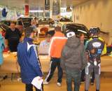 Jaarmaarktcross registration was held in a car dealership showroom.   ? Christine Vardaros