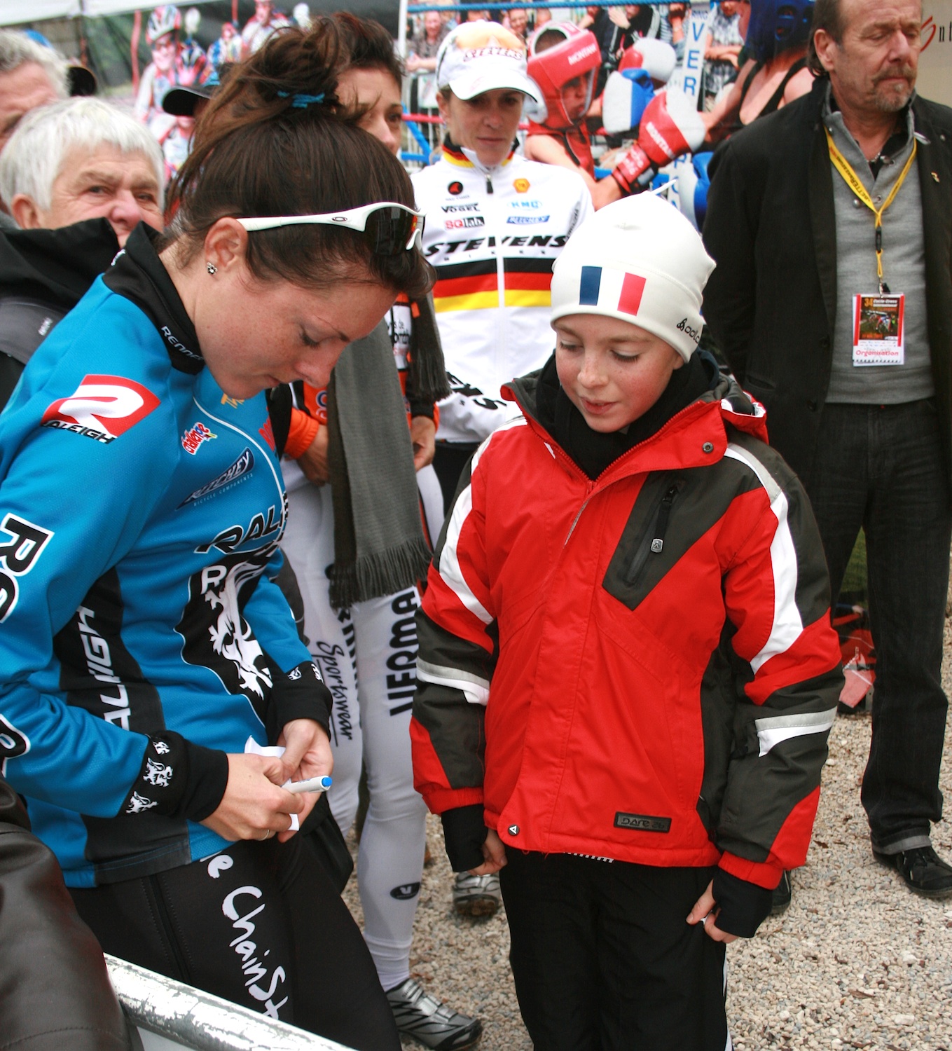 Gabby Day signs an autograph. ©Renner Custom CX Team