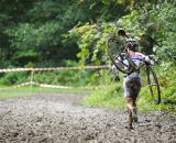 Wyman runs through the muck. ©  Jeff Bramhall