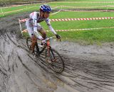 Helen Wyman rolls through the mud.  ©  Jeff Bramhall