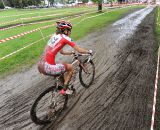 Lea Davidson rolls through the mud. ©  Jeff Bramhall