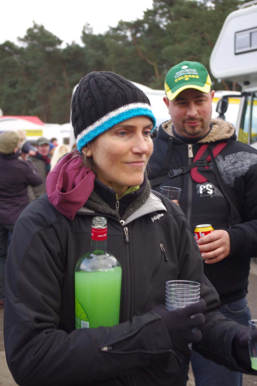 Vardaros hands out recovery drinks after the race. ? Jonas Bruffaerts