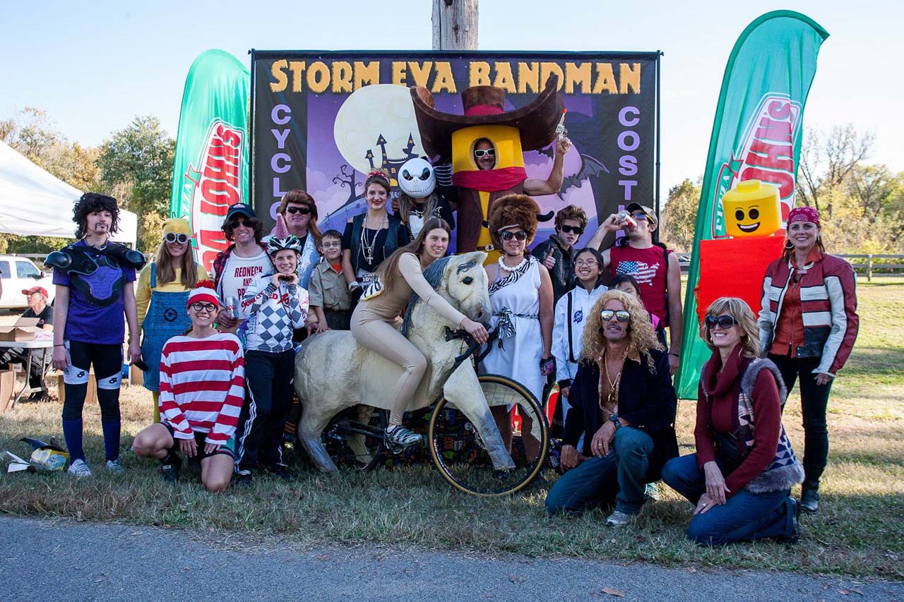 Costume contest entrants surround the podium. © Kent Baumgardt