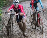 Messer runs through the mud while Petrovrides. © Kent Baumgardt