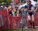 Katie Compton (Planet Bike) pulls away from the field in second lap action over the SRAM Service Course barrier section. By the third lap she was solidly away on her own. © Wil Matthews