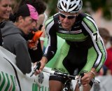 Jeremy Powers (Cannondale-Cyclocrossworld) grits his way over the run-up in front of an enthusiastic crowd. © Wil Matthews