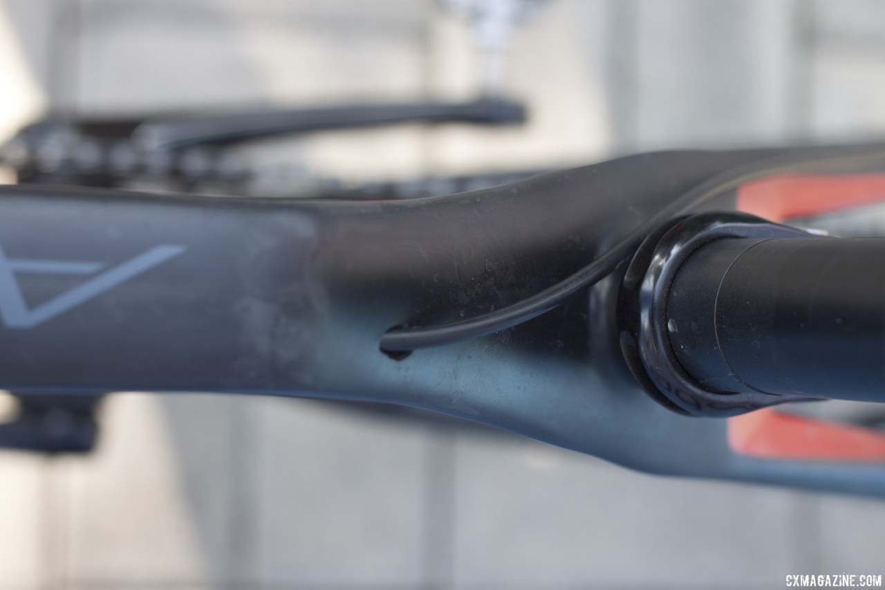 The Apollo Arctec CX’s rear derailleur cable location, coming out the top tube, is somewhat non-standard when compared to other bike makers\' internal routing methods. © Cyclocross Magazine