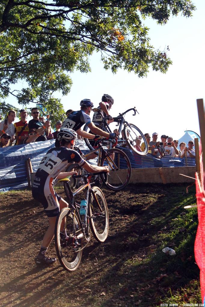 Riders tackle the barriers. © Cyclocross Magazine