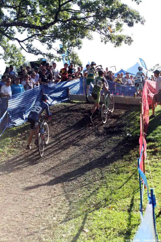 A pack of four makes it over the barriers. © Cyclocross Magazine