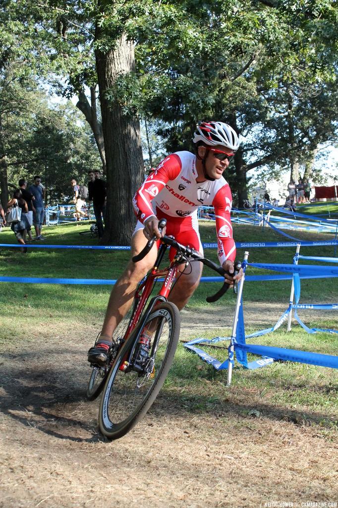 A rider accelerates coming through a turn. © Cyclocross Magazine