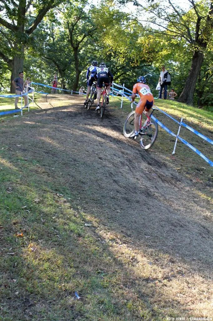 Several riders chase up the hill. © Cyclocross Magazine