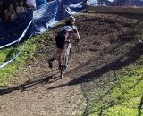 A lone rider dismounts ahead of the barrier. © Cyclocross Magazine