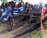 A pack of four makes it over the barriers. © Cyclocross Magazine