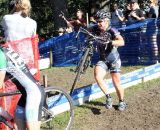 Racer leader Laura Van Gilder moves through the barriers and prepares to pass a rider. © Keith Hower 