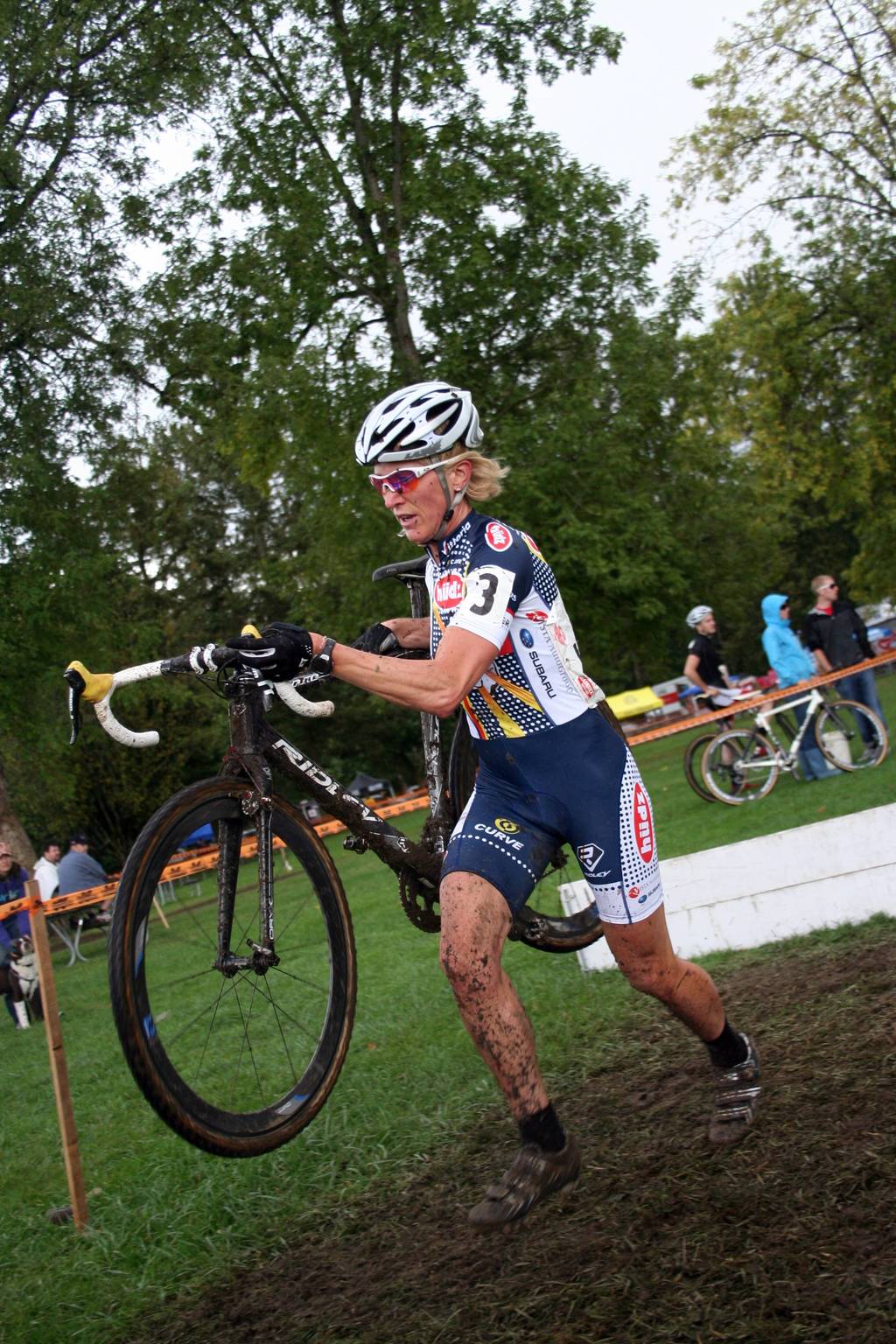 Sue Butler crossing the barrier. Photo by Robbie Carver