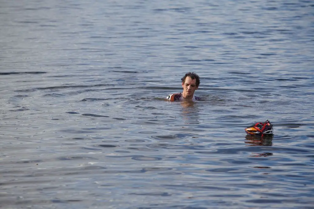 Post-race swim in Lake Sammamish after a muddy day at the races. © Joe Sales