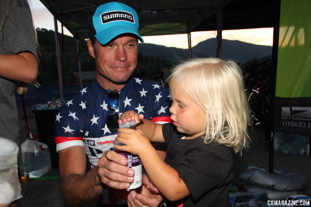 Page celebrating the night with his daughter. 2013 Raleigh Midsummer Night\'s race. © Cyclocross Magazine