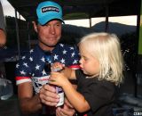 Page celebrating the night with his daughter. 2013 Raleigh Midsummer Night's race. © Cyclocross Magazine