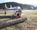 Page leads Berden through the logs, one of four dismounts for the average racer. © Cyclocross Magazine