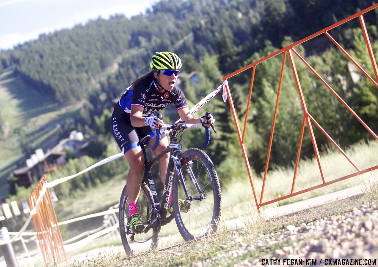 Mani bombs the descent in attempt to keep her last lap gap. © Cathy Fegan-Kim