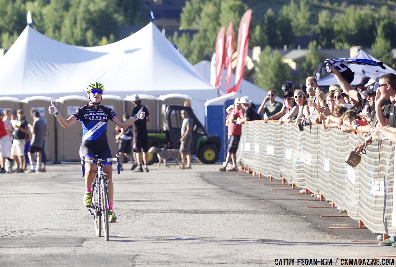 Mani winning in front her sponsors and fans. 2013 Raleigh Midsummer Night\'s cyclocross race. © Cathy Fegan-Kim