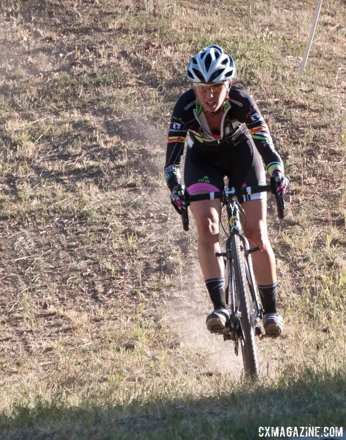 Rebecca Gross storming over the bumpy terrain at Raleigh Midsummer Night\'s Cross. © Cyclocross Magazine